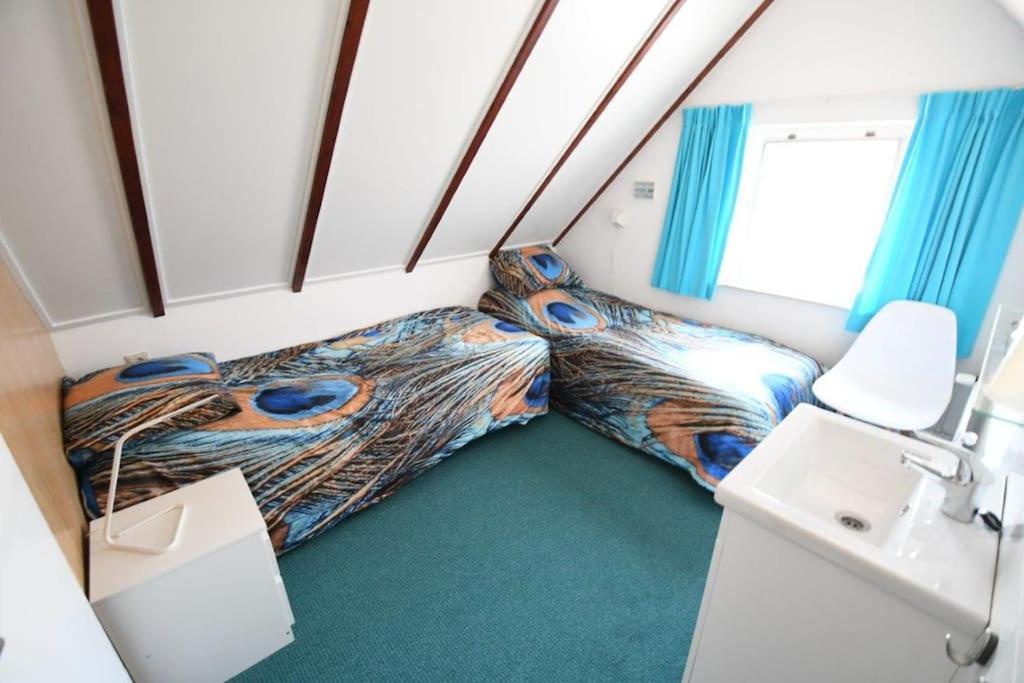 Vrijvakantiehuis Blumstraat 1 อาชเตแกร์เกอ ภายนอก รูปภาพ
